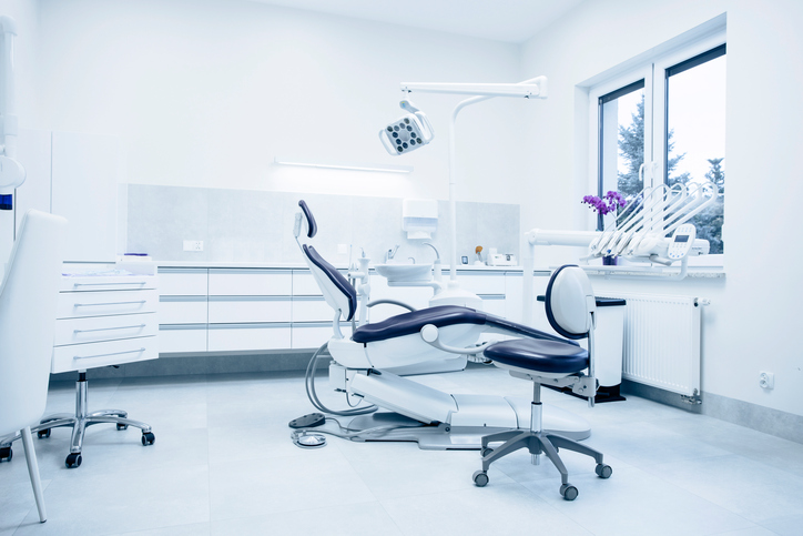 Modern dentist office with chair and equipment